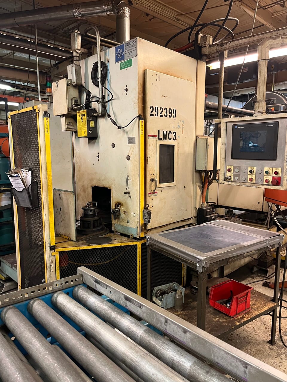 PECo production machinery and a worktable on the shop floor